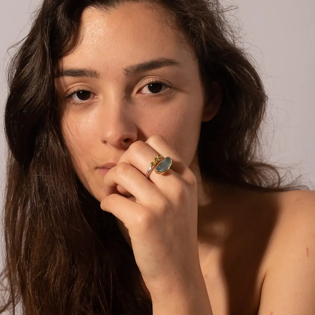 18 k Gold Ring with Aqua Marine and Peridots